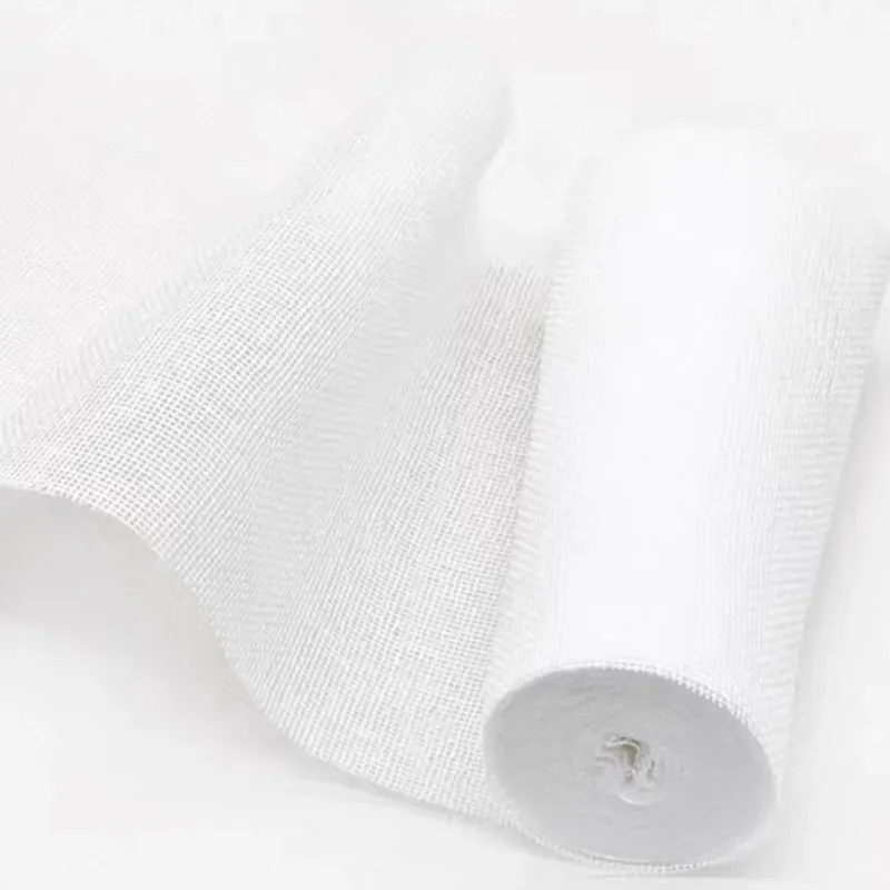 Soft cotton gauze being folded – demonstrating flexibility